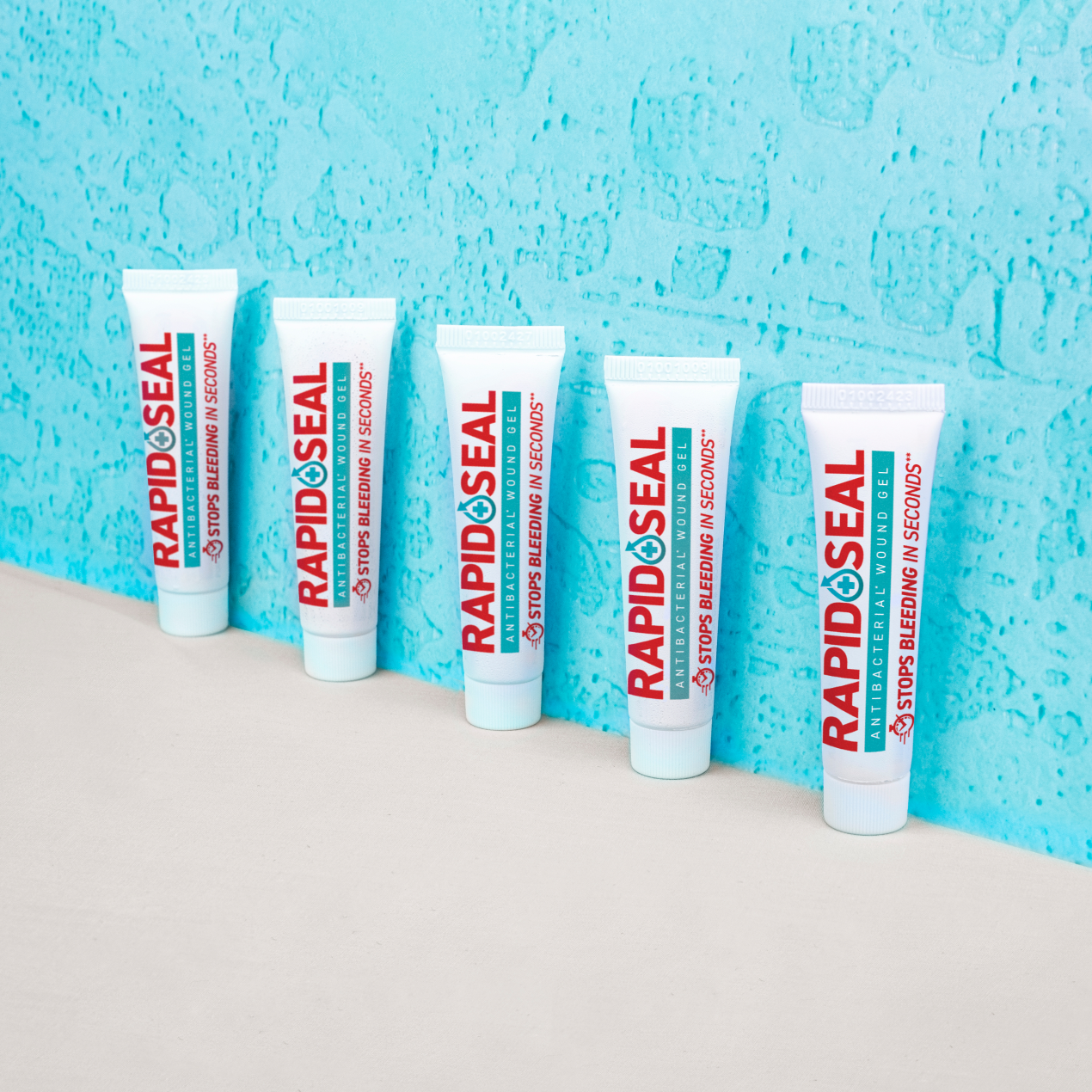 lineup of rapid seal tubes up against a colored background